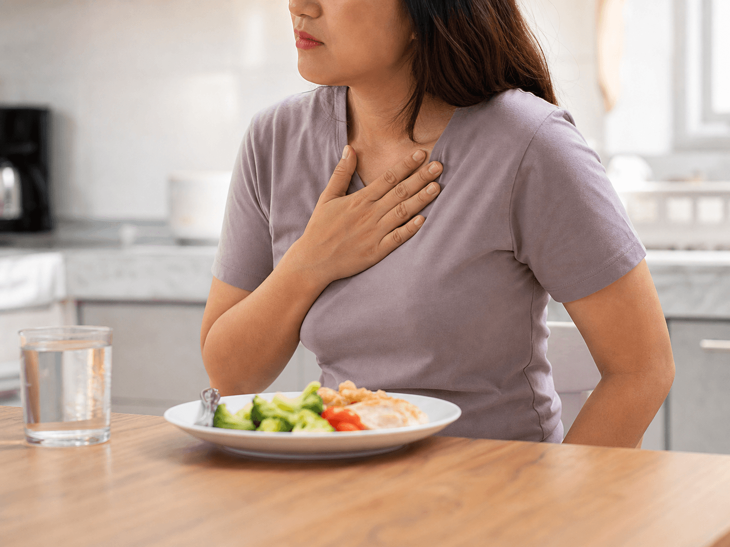 Generated clinical photo showing an adult with heartburn discomfort after eating